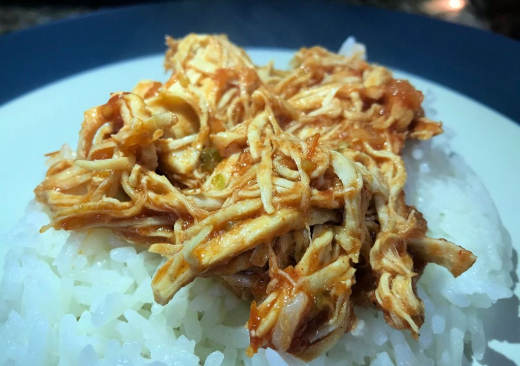 Salsa chicken can be served over rice.
