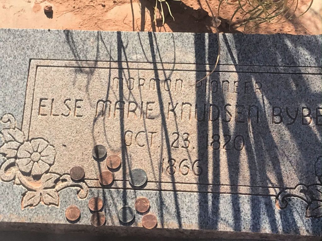Coins left on headstone of grave in Grafton Utah