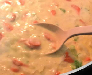 The filling for this chicken pot pie is think and creamy.